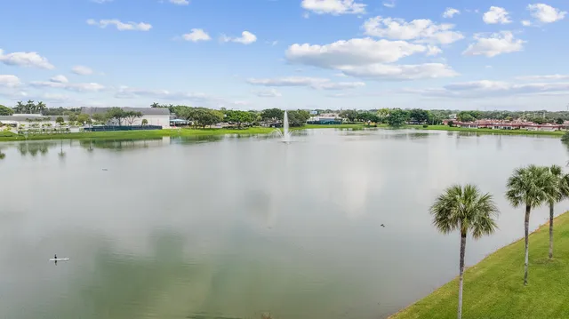 a view of lake with green space