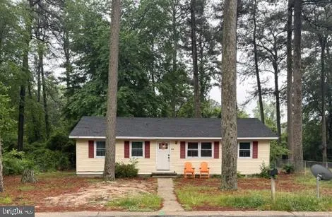 front view of a house and a yard