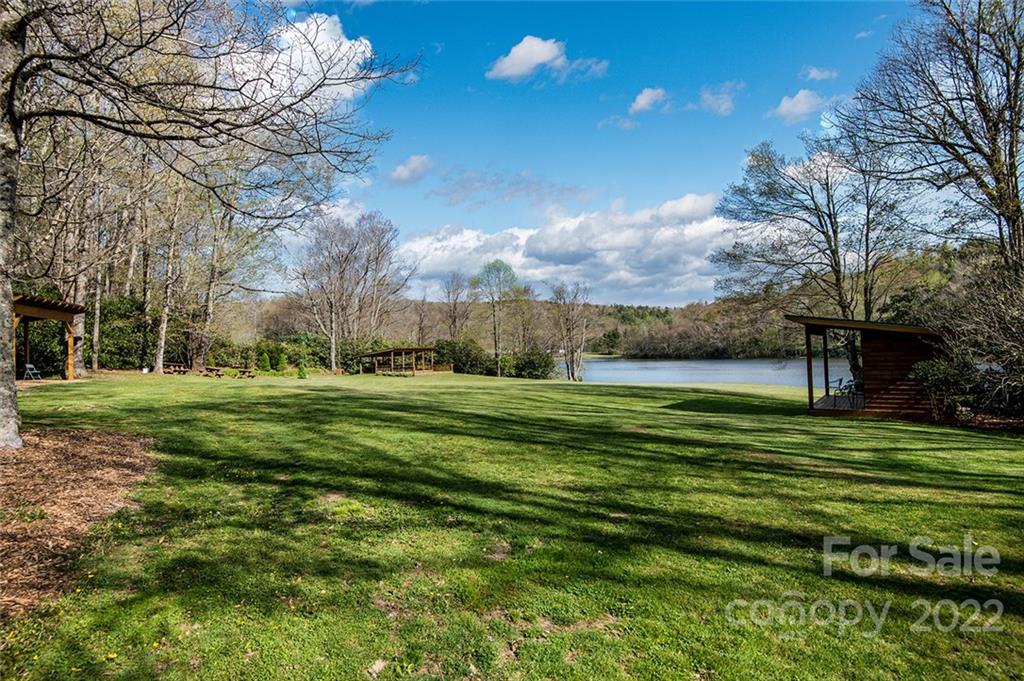 20 Lady Slipper Loop Newland, NC 28657 - Photo 15 of 44 a view of a golf course with a lake view