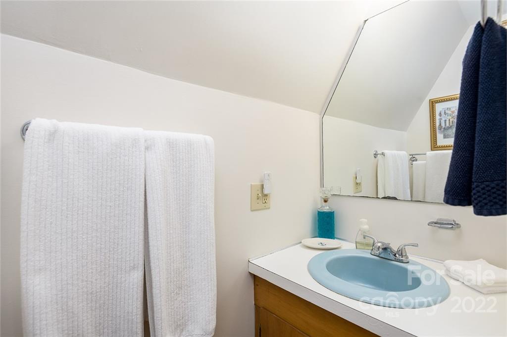20 Lady Slipper Loop Newland, NC 28657 - Photo 29 of 44 a bathroom with a sink and a mirror