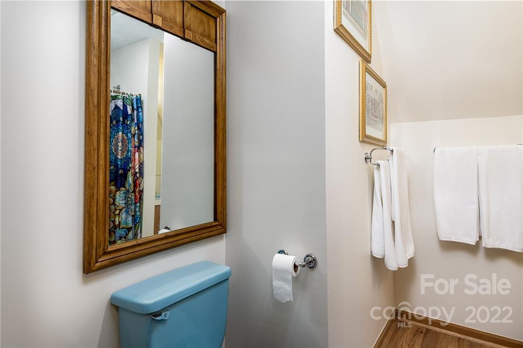 20 Lady Slipper Loop Newland, NC 28657 - Photo 30 of 44 a view of a hallway with paintings on the wall