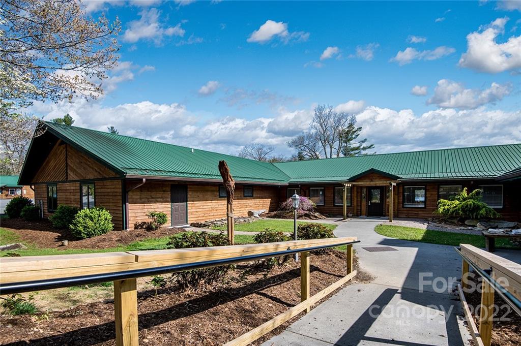 20 Lady Slipper Loop Newland, NC 28657 - Photo 34 of 44 a view of house with yard and outdoor seating