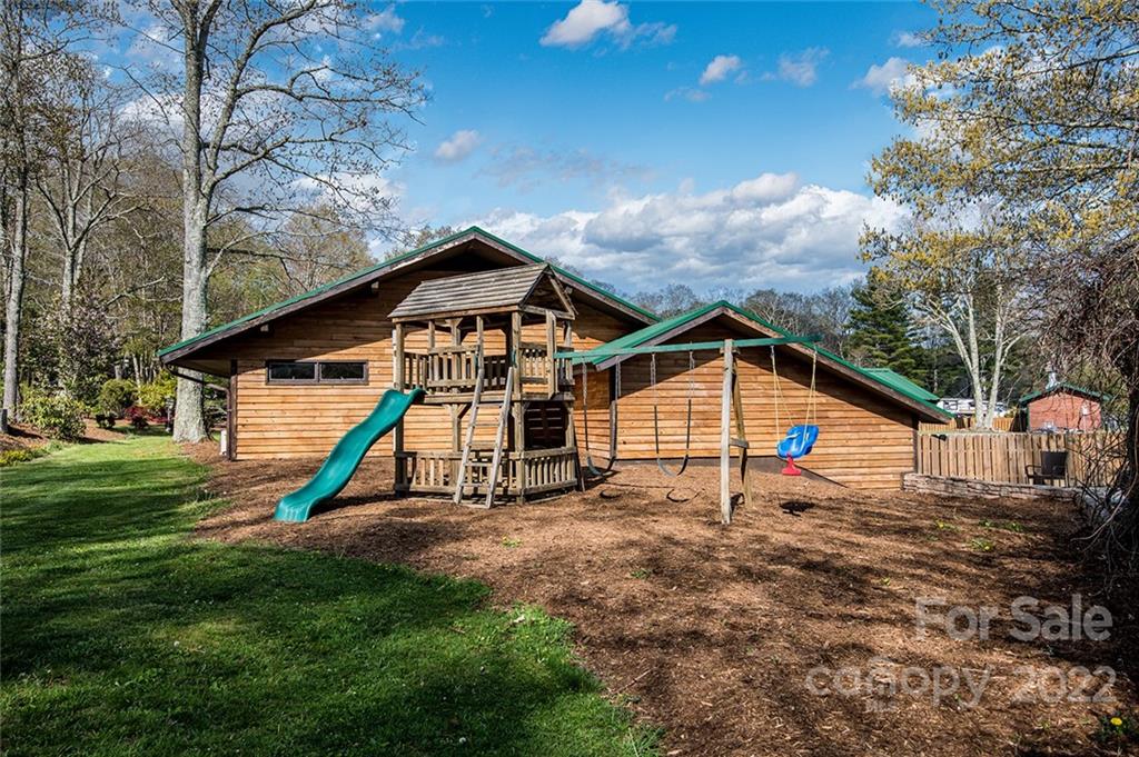 20 Lady Slipper Loop Newland, NC 28657 - Photo 41 of 44 a view of a house with a yard and wooden fence