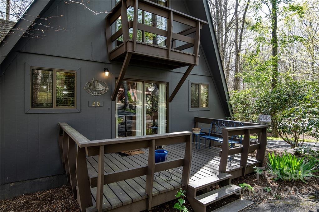 20 Lady Slipper Loop Newland, NC 28657 - Photo 7 of 44 a view of a chairs and table in the balcony
