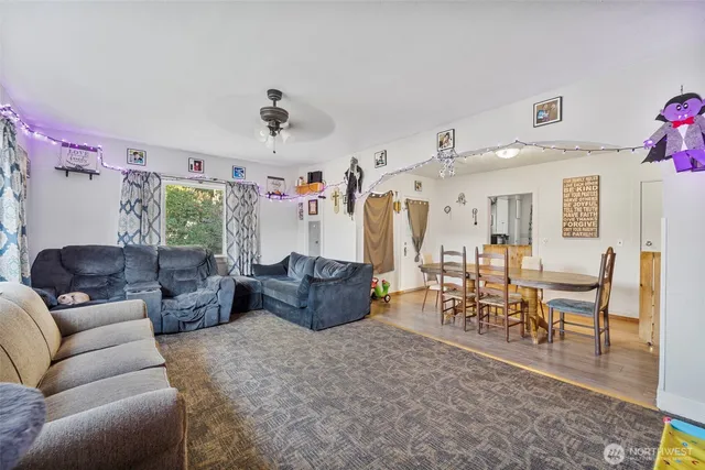 a living room with furniture and a table