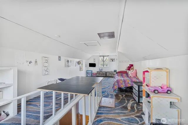 a livingroom with furniture and toys