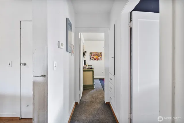 a view of a hallway with kids room