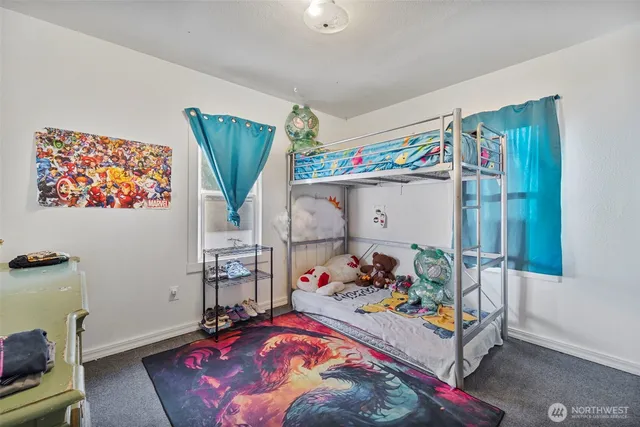 a bedroom with furniture and a bed