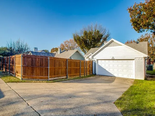a view of a house with a garage