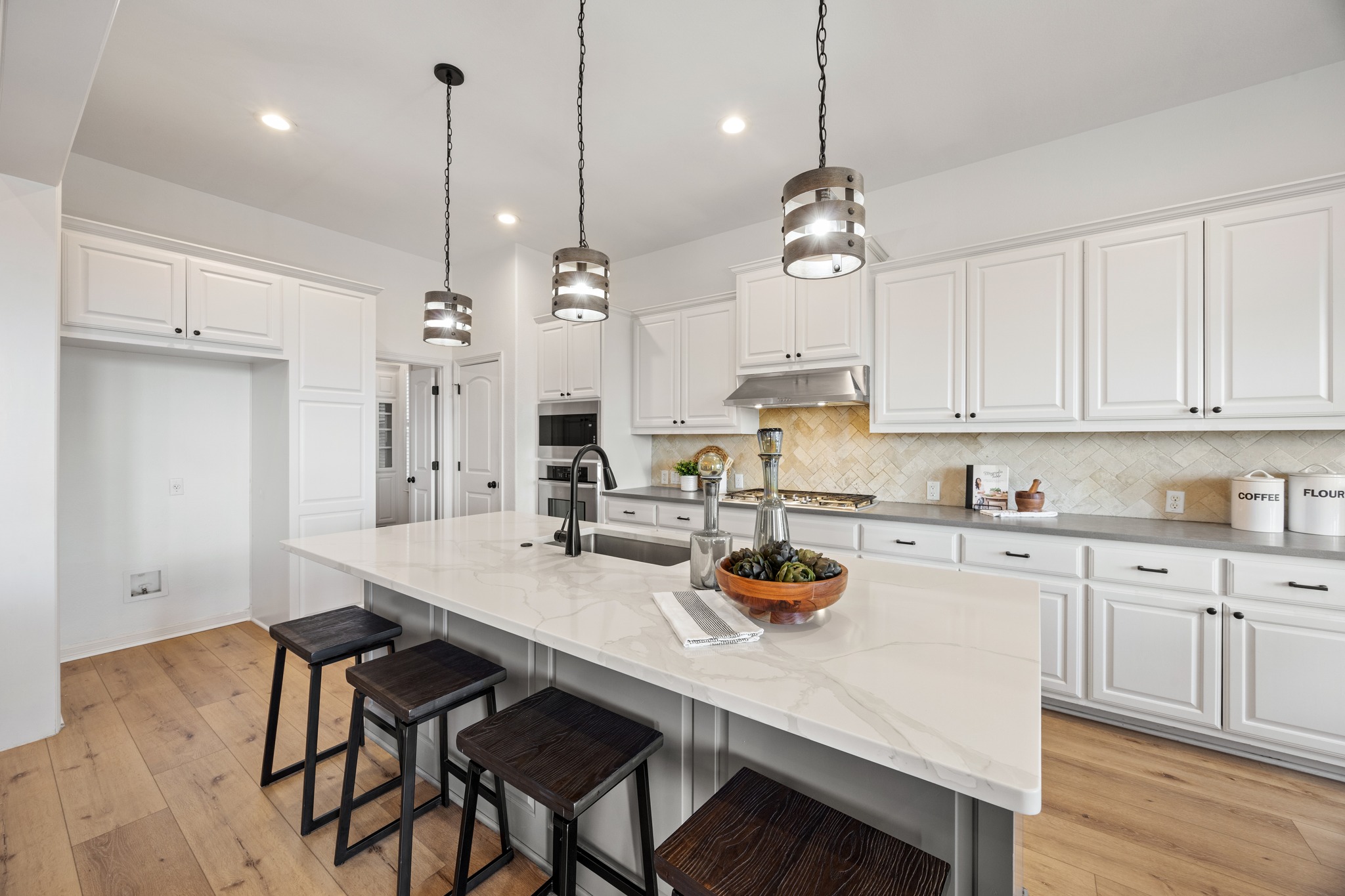 366 Mirafield Lane Austin, TX 78737 - Photo 19 of 34 Spacious kitchen island with seating