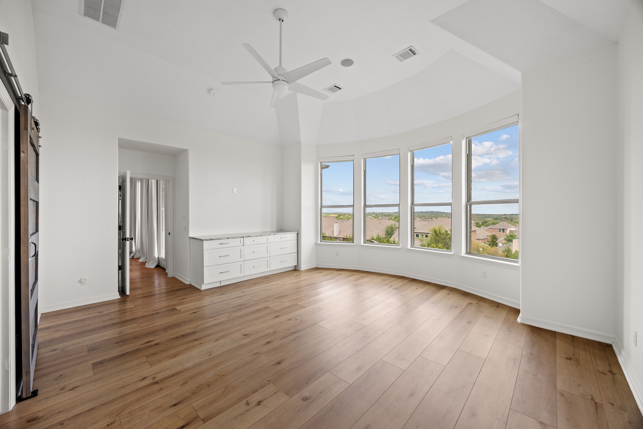 366 Mirafield Lane Austin, TX 78737 - Photo 23 of 34 Premium built-in cabinetry in primary bedroom