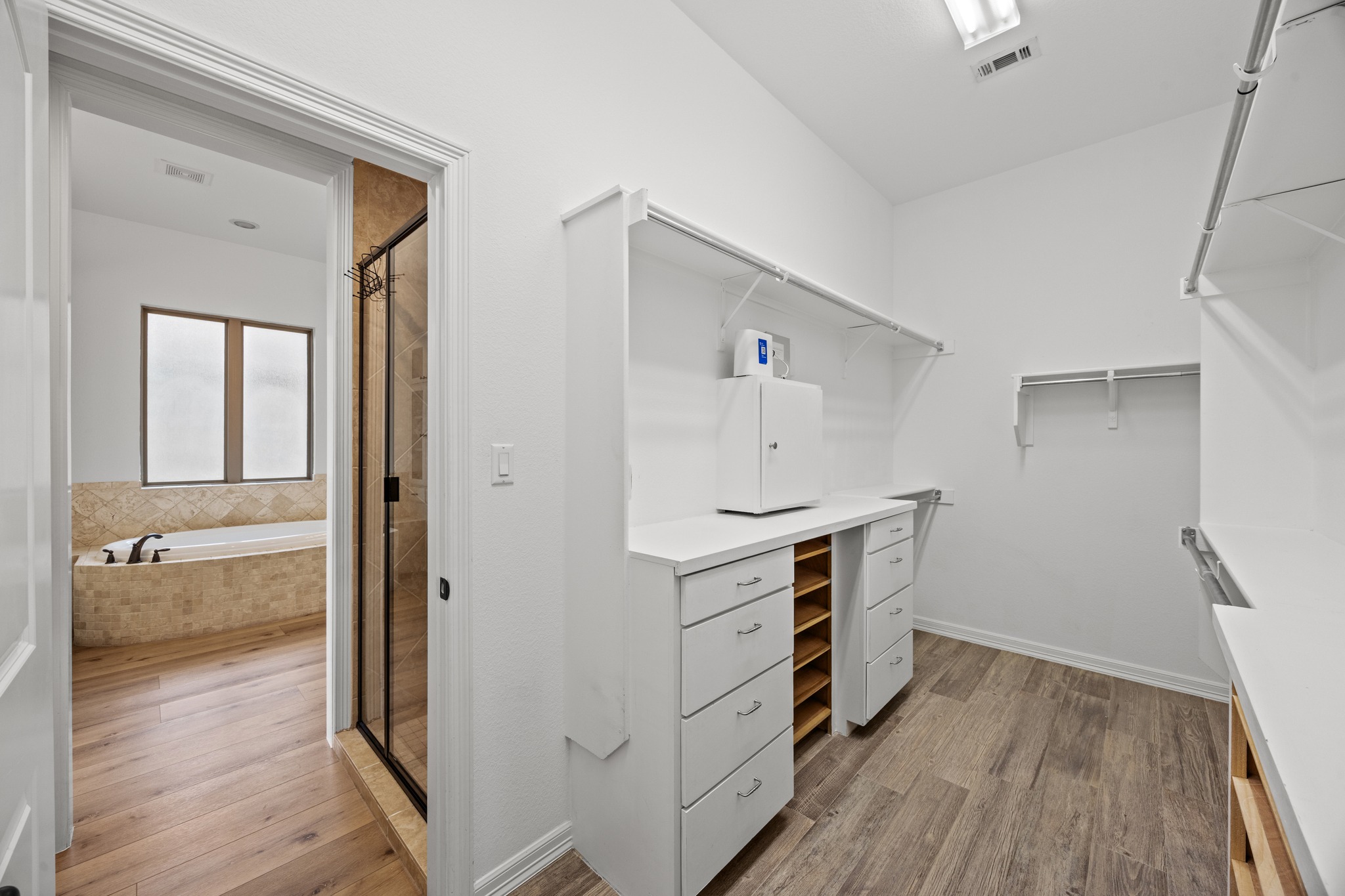 366 Mirafield Lane Austin, TX 78737 - Photo 27 of 34 Primary closet with premium built-in cabinetry