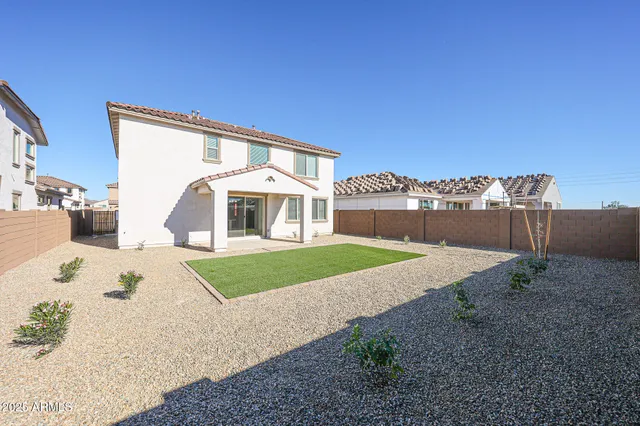 a view of a house with a patio