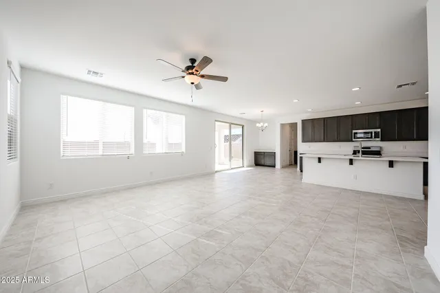 a view of a kitchen with furniture and a kitchen