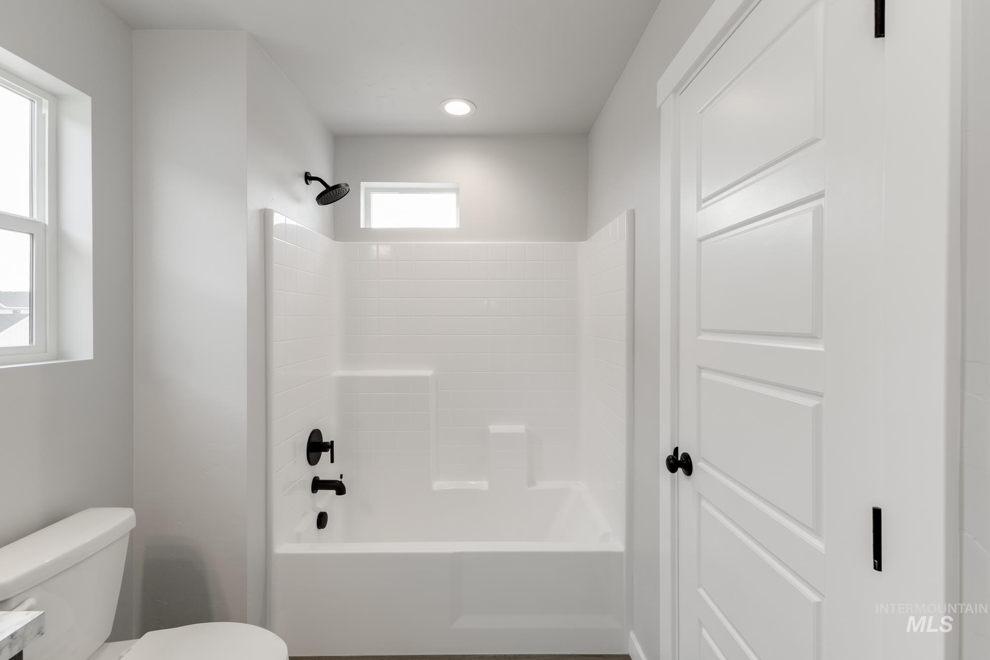 3672 West Dover Drive Meridian, ID 83642 - Photo 16 of 23 Full bath with shower combination and toilet