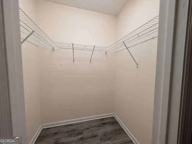 a view of a room with racks on the wall