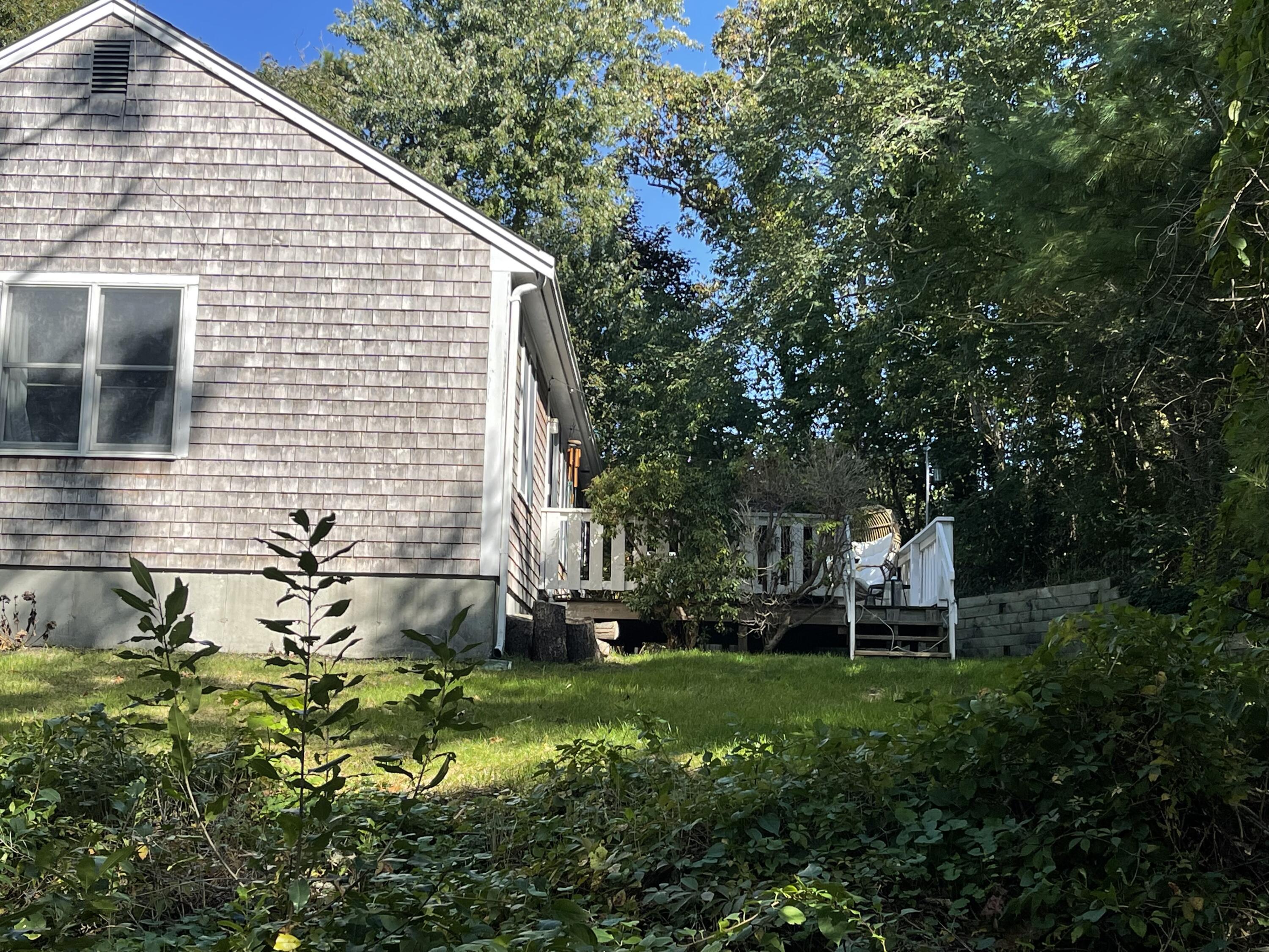 3 Nickerson Road Harwich, MA 02645 - Photo 20 of 23 a view of house with backyard