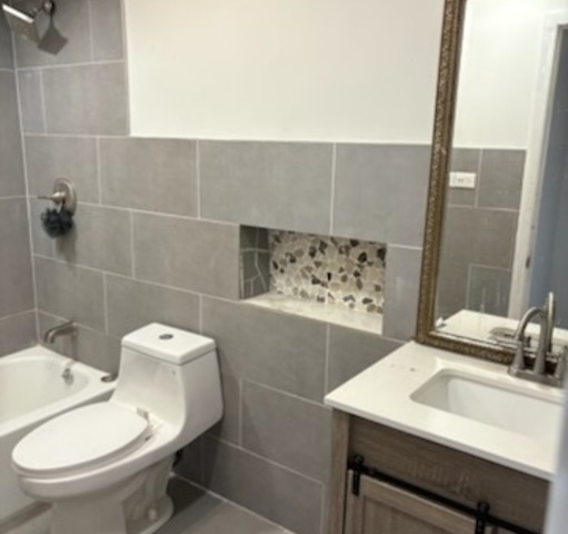 550 Michigan City Road, Unit 3A Calumet City, IL 60409 - Photo 9 of 10 a bathroom with a sink toilet and shower