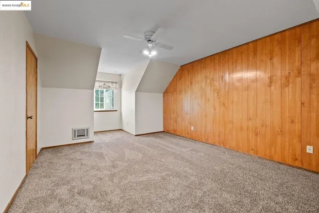 a swimming pool with outdoor seating and yard