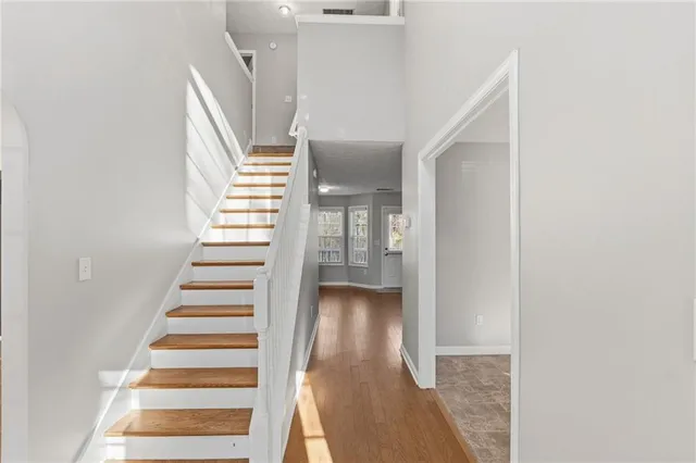 a view of entryway with wooden floor