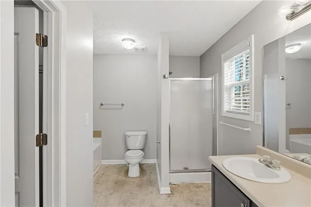 a bathroom with a sink double vanity and a mirror