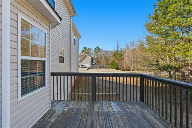 a view of a yard with trees