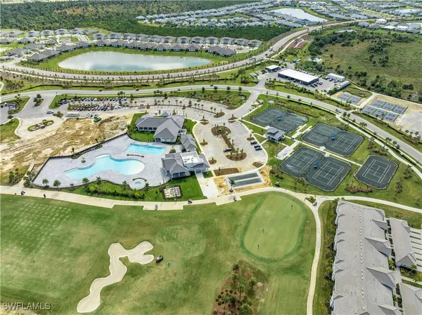 a view of kitchen with furniture and wooden floor