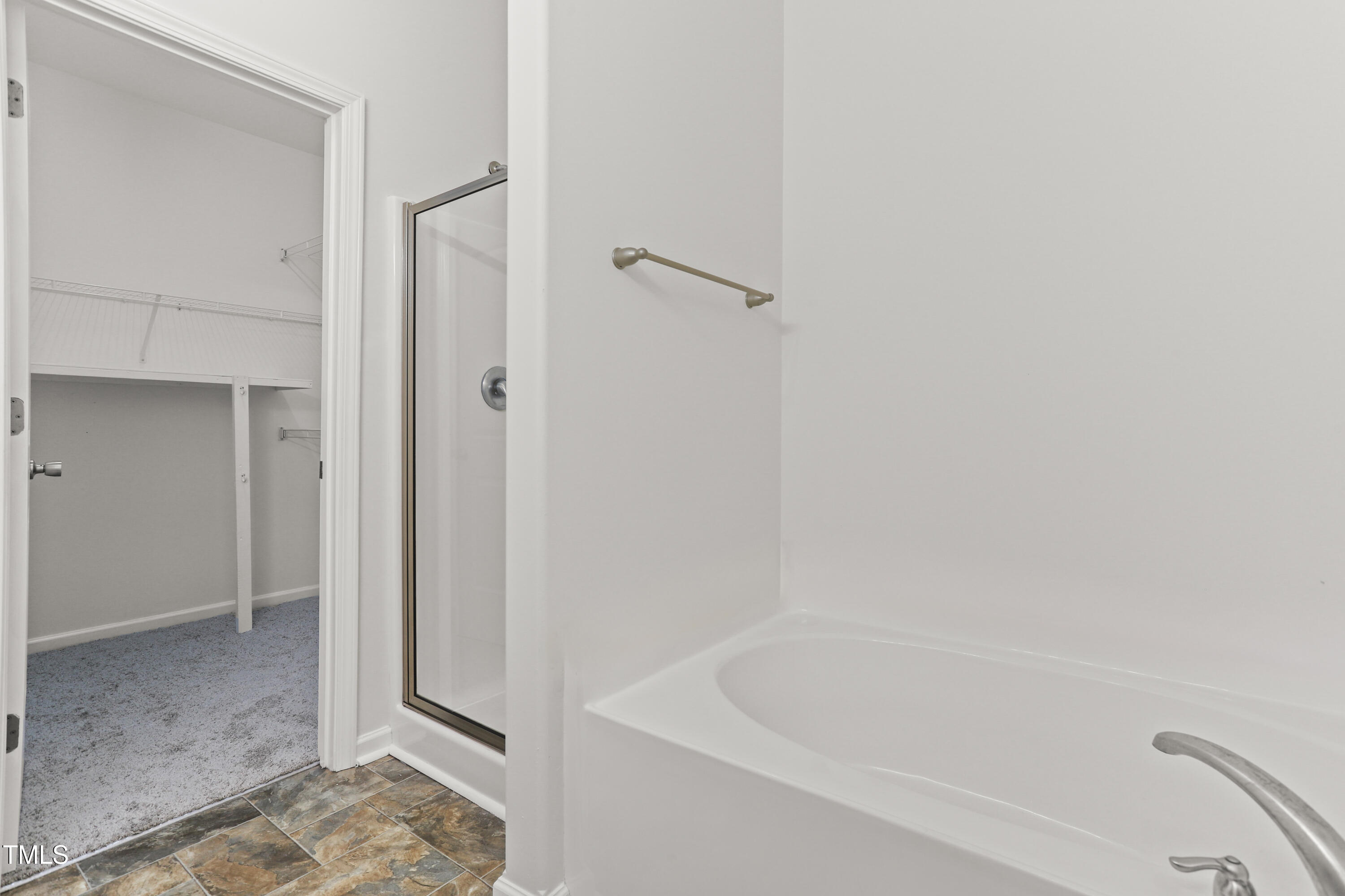 6420 Hatchies Drive Raleigh, NC 27610 - Photo 14 of 24 a bathroom with a bathtub