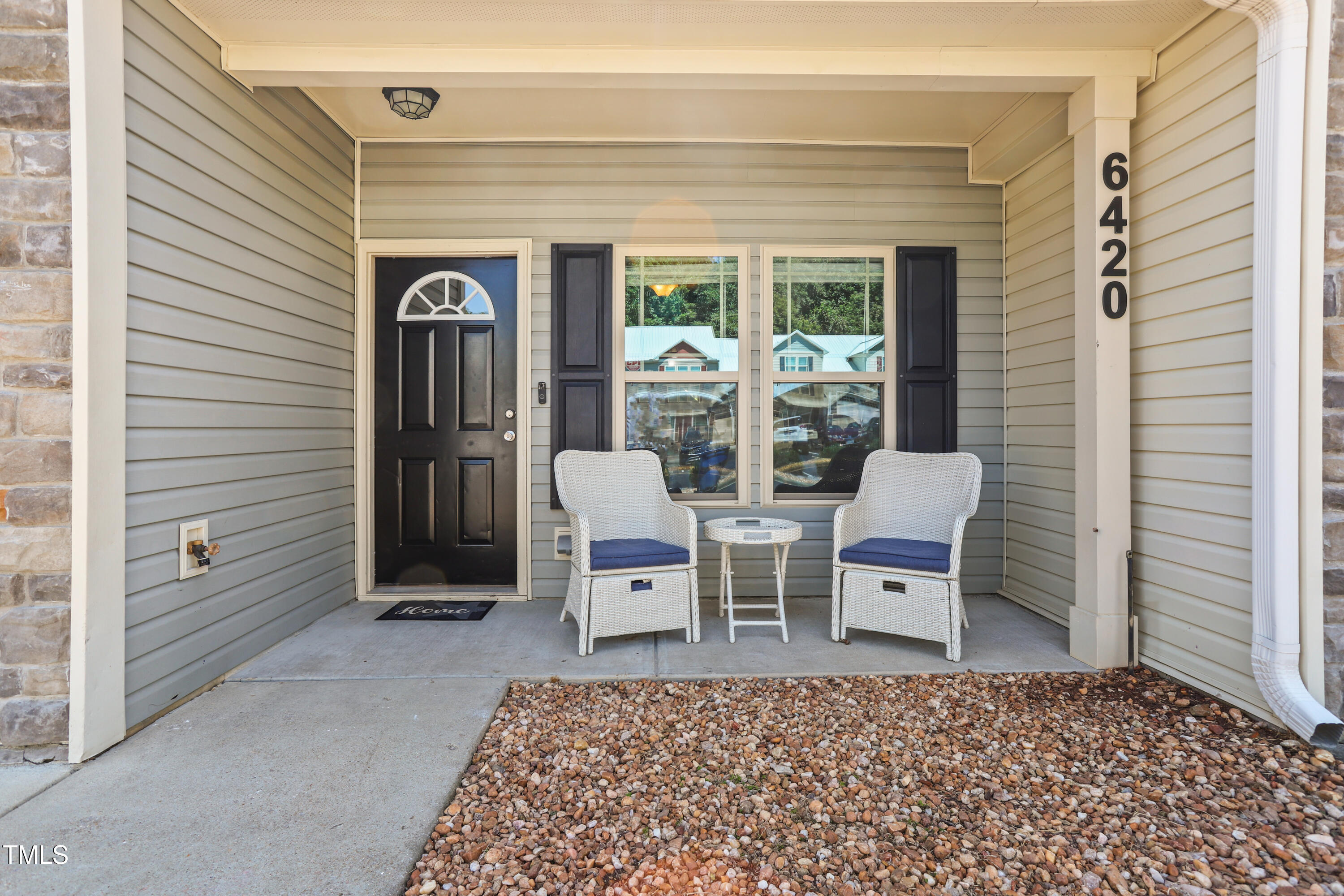 6420 Hatchies Drive Raleigh, NC 27610 - Photo 2 of 24 a view of an outdoor space with porch and wooden floor