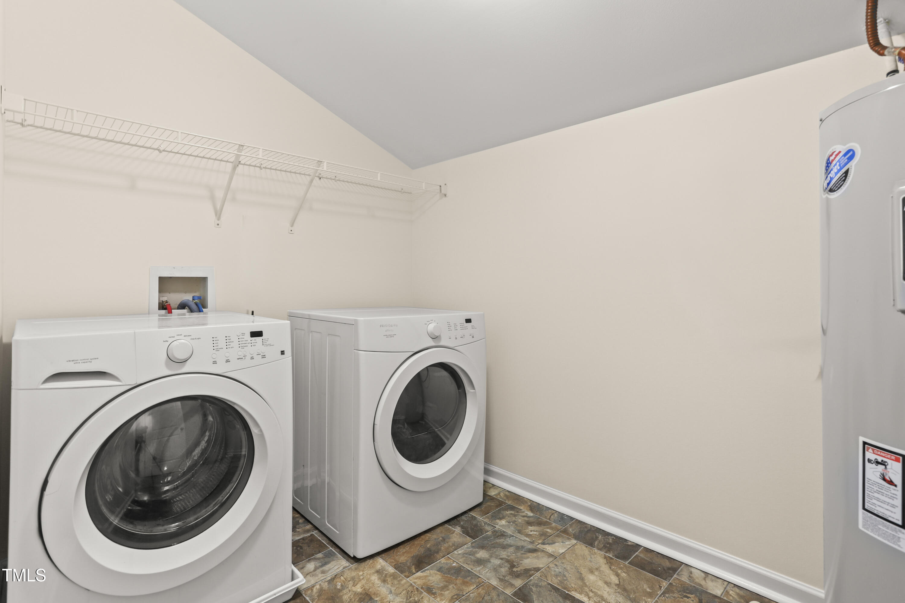 6420 Hatchies Drive Raleigh, NC 27610 - Photo 23 of 24 a utility room with dryer and washer