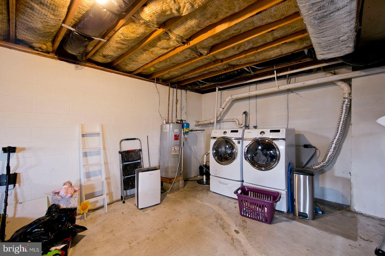 284 Fegan Road Bunker Hill, WV 25413 - Photo 31 of 35 Laundry area, new sump pump