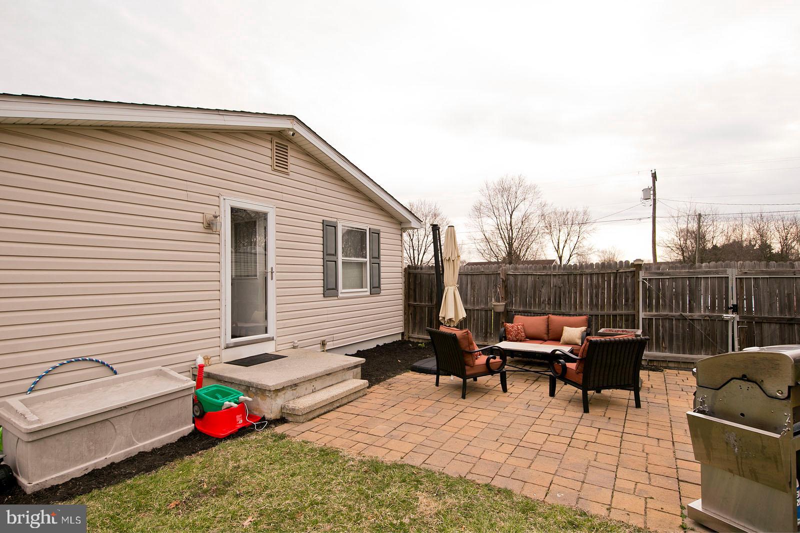 284 Fegan Road Bunker Hill, WV 25413 - Photo 5 of 35 Lovely patio off the kitchen entrance: grill time!