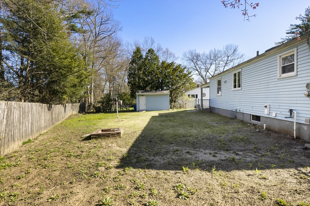 165 Sawmill Road Springfield, MA 01118 - Photo 11 of 39 a view of a yard with a house