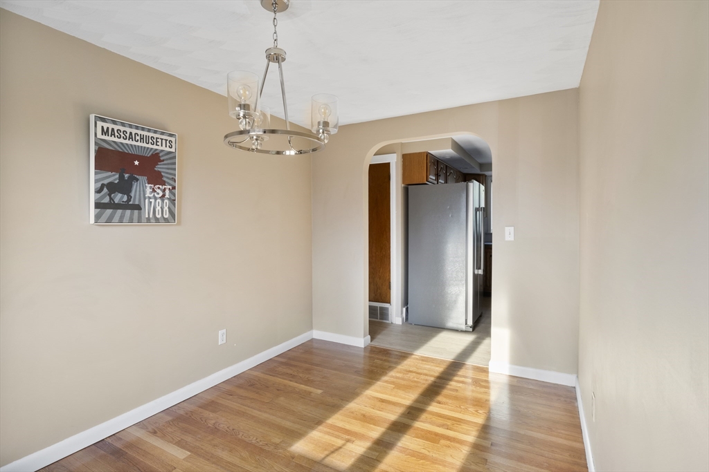 165 Sawmill Road Springfield, MA 01118 - Photo 20 of 39 a view of a room with wooden floor and windows