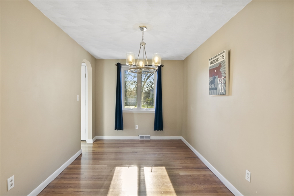 165 Sawmill Road Springfield, MA 01118 - Photo 21 of 39 a view of a hallway with windows and chandelier