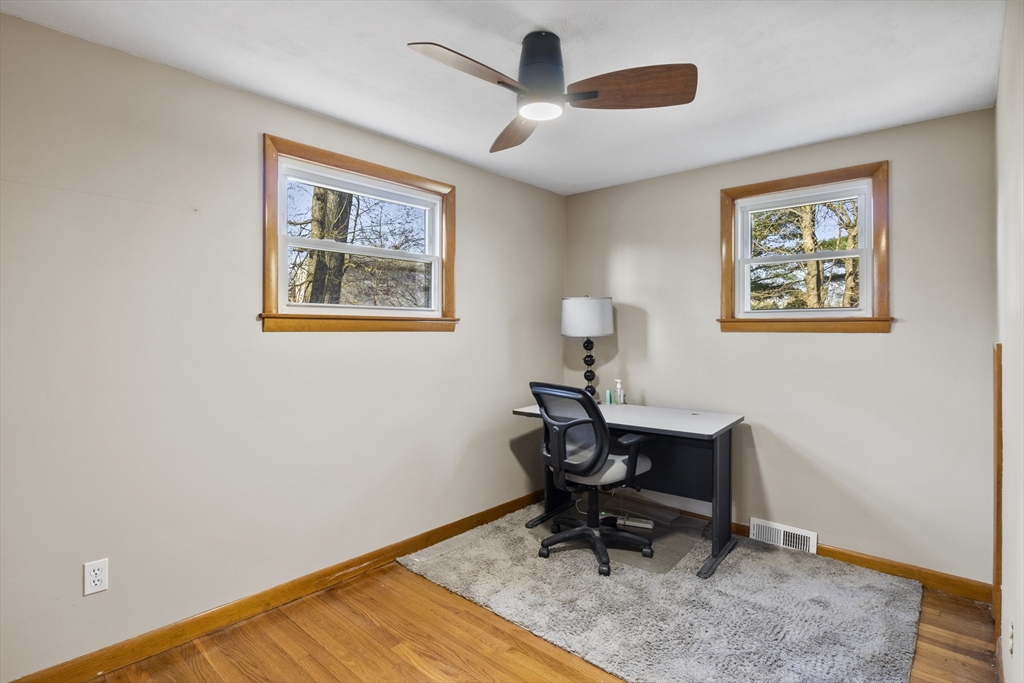 165 Sawmill Road Springfield, MA 01118 - Photo 28 of 39 a view of a workspace with furniture and a window