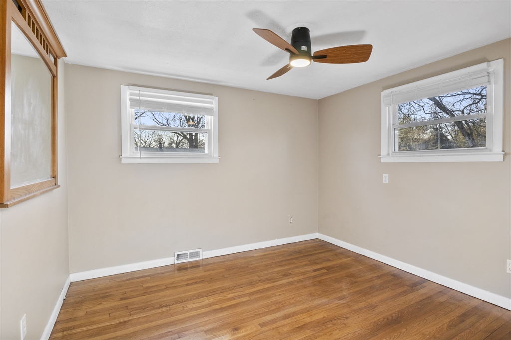 165 Sawmill Road Springfield, MA 01118 - Photo 30 of 39 a view of an empty room with wooden floor