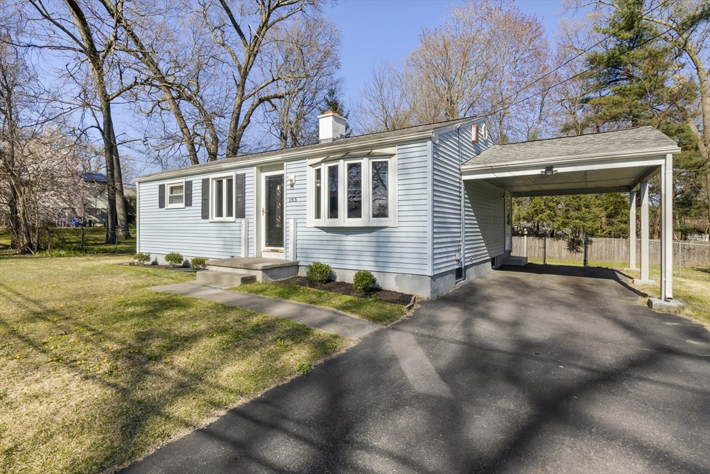 165 Sawmill Road Springfield, MA 01118 - Photo 3 of 39 a front view of a house with a yard