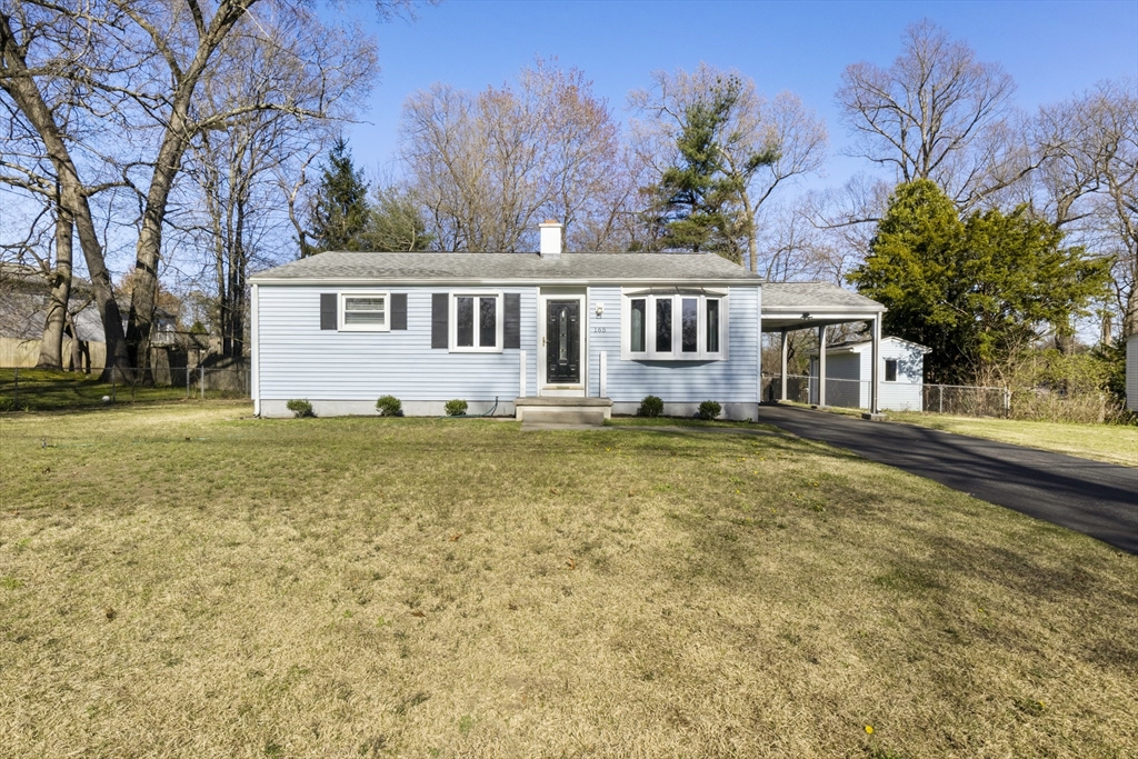 165 Sawmill Road Springfield, MA 01118 - Photo 6 of 39 a front view of a house with a garden