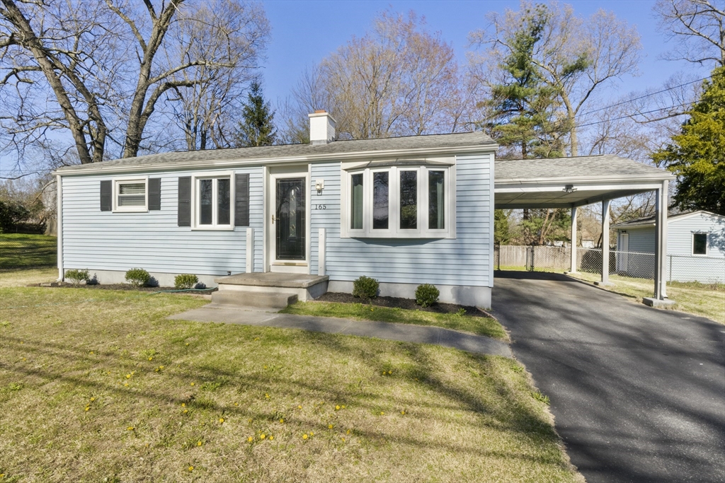 165 Sawmill Road Springfield, MA 01118 - Photo 7 of 39 a front view of a house with a garden