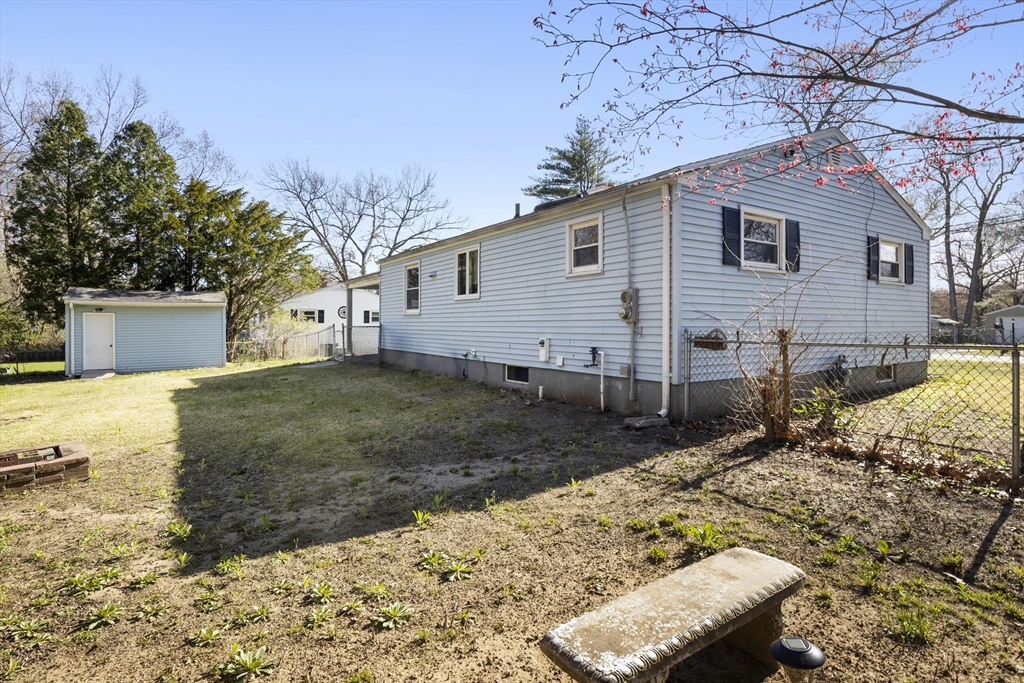 165 Sawmill Road Springfield, MA 01118 - Photo 10 of 39 a view of a house with a yard covered in snow