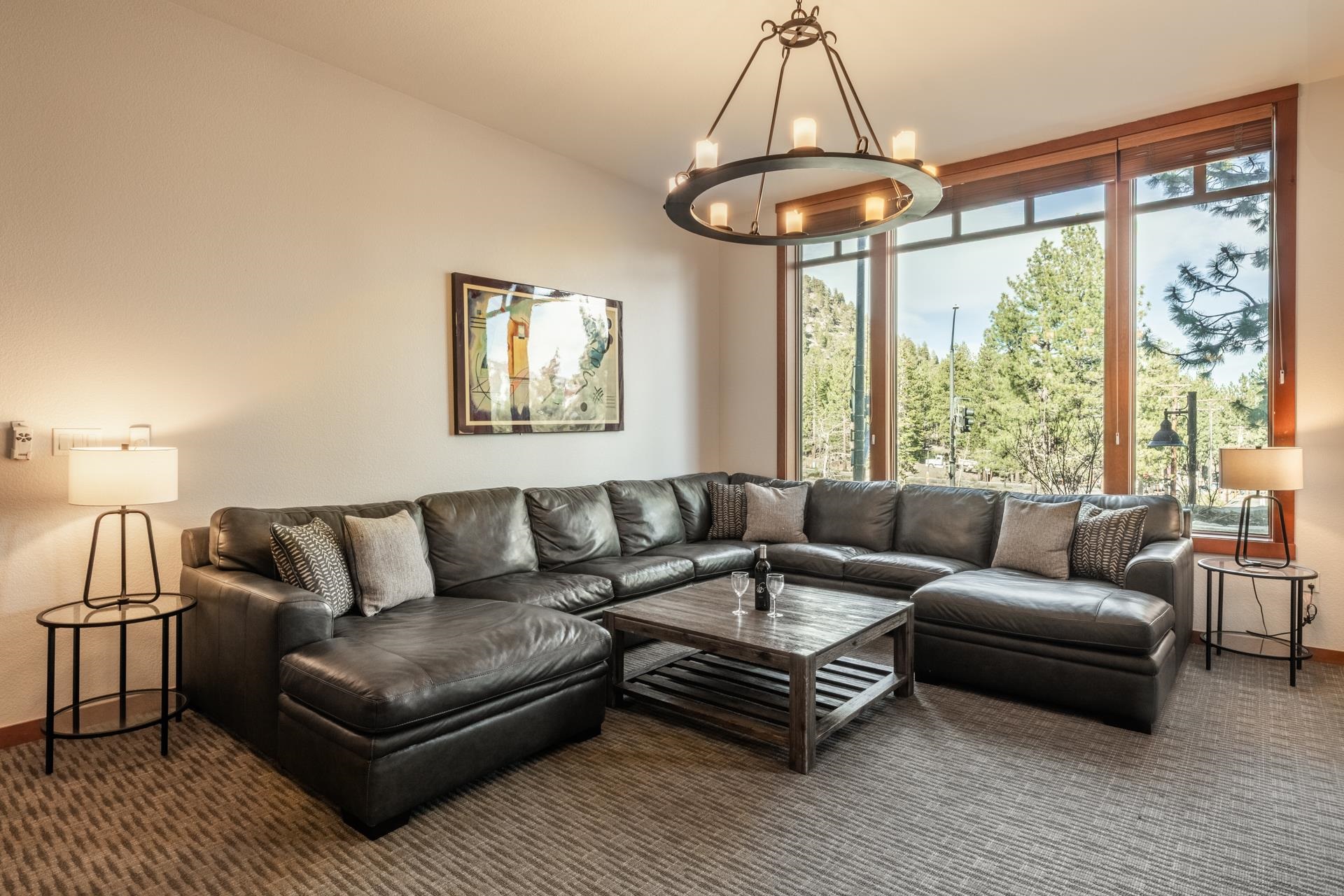 6201 Minaret Road, Unit 2117 Mammoth Lakes, CA 93546 - Photo 2 of 47 a living room with furniture and a large window