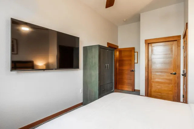 a view of a livingroom with a flat screen tv