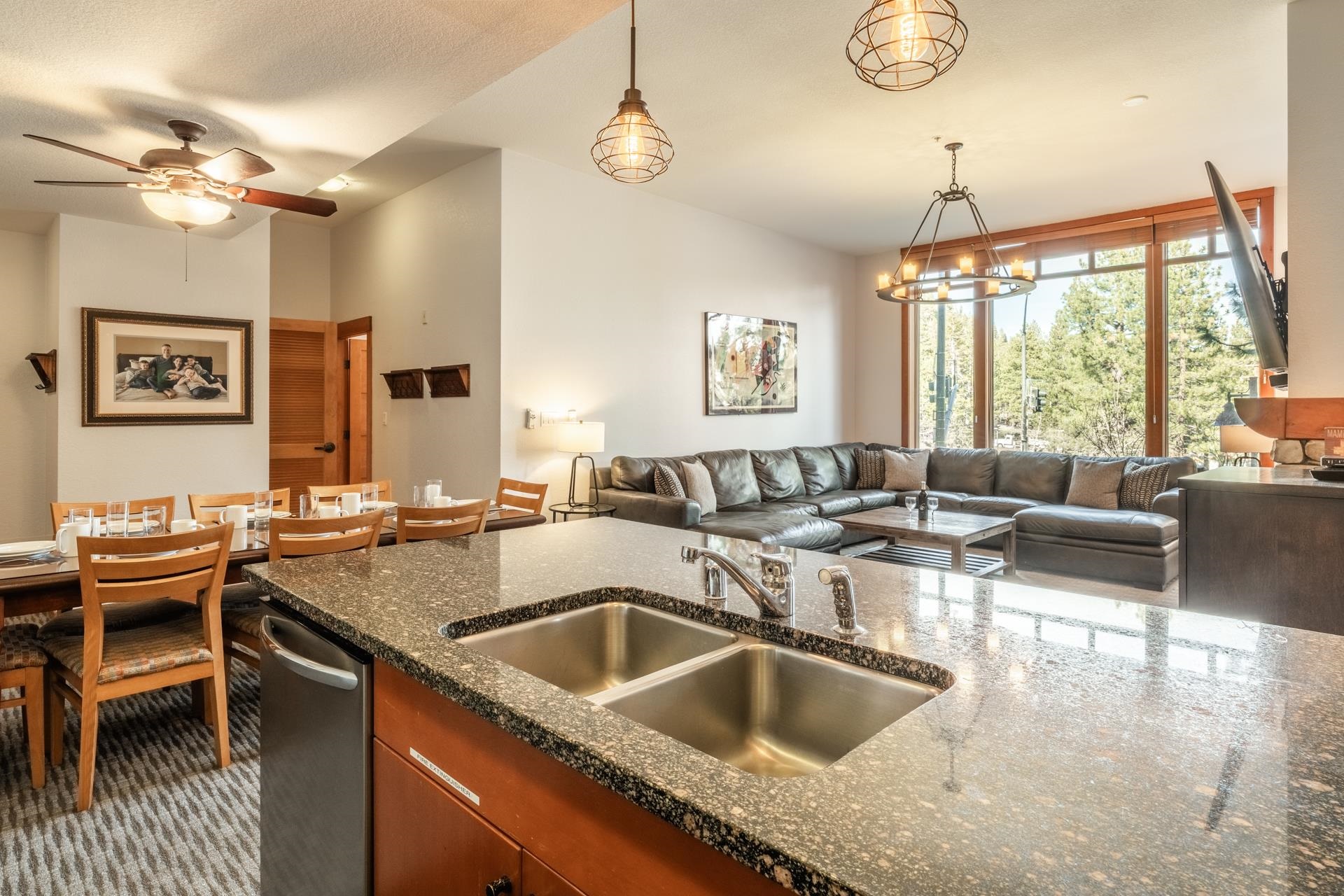 6201 Minaret Road, Unit 2117 Mammoth Lakes, CA 93546 - Photo 8 of 47 a kitchen with granite countertop a sink and a stove
