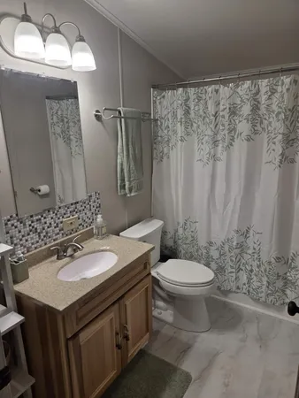 $210,000 | 405 Beacon Lane, Roscommon, MI 48653