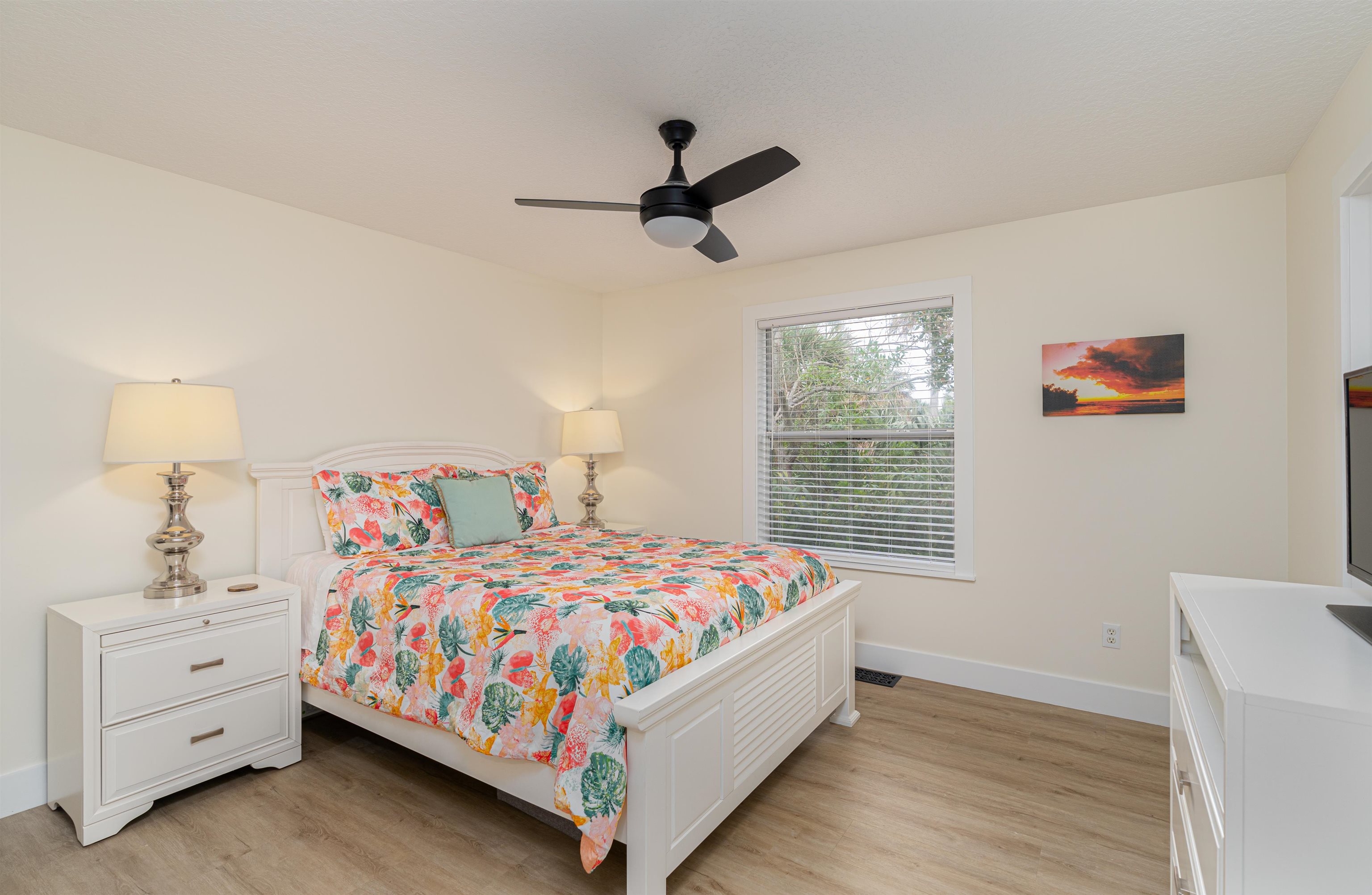 203 E Street, Unit C St. Augustine, FL 32080 - Photo 11 of 36 a bedroom with a bed and a window