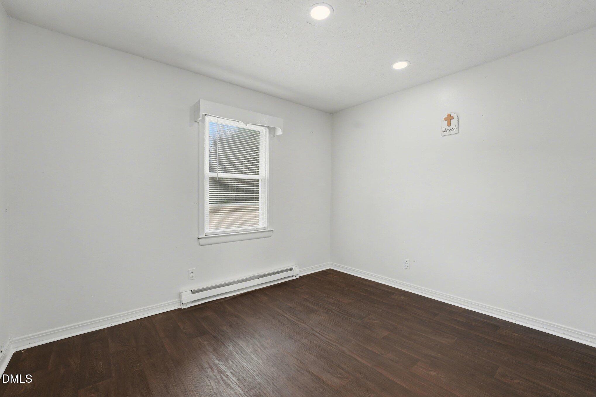 170 Flowers Road Mount Olive, NC 28365 - Photo 6 of 19 a view of a room with wooden floor and windows