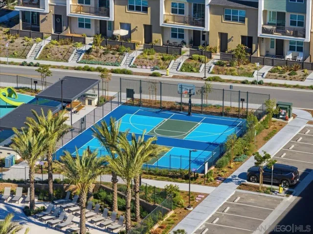 a view of a swimming pool with outdoor seating