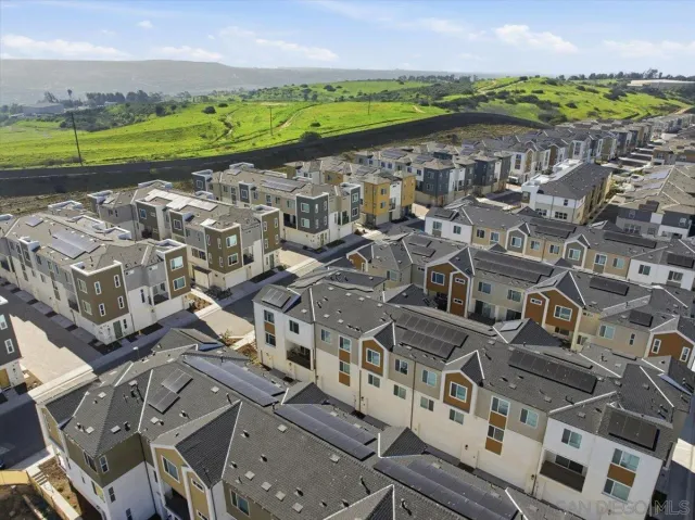 a view of a city with an ocean view