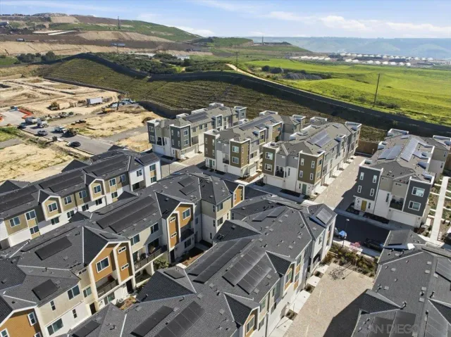 a view of a city with an ocean view